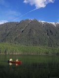 Man and Woman Canoeing in Mirror Lake  Chugach Mountains  Anchorage  Alaska  USA
