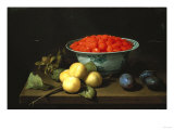 Strawberries in a Bowl  with Other Fruit  on a Table