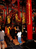 Monk and Devotees Praying at Yuantong Temple  Kunming  Yunnan  China