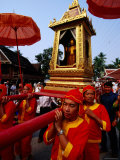 Men in Traditional Costume Carrying Phra Bang Buddha Image  Luang Prabang  Laos