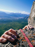 Climbers Hands Holding Onto Rock Ledge  Alberta  Canada