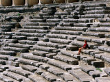 Aspendos Roman Theatre Seats and Seated Woman  Aspendos  Antalya  Turkey