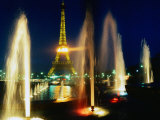 The Eiffel Tower at Night with Fountains in the Foreground  Paris  France