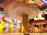 Swirling Skirts of Traditional Dancers in Motion at Pena Restaurant Huari  La Paz  Bolivia