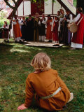 Woman Musicians Performing to Child at Festivitas Middle Ages Festival  Lund  Skane  Sweden