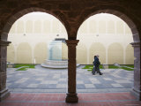 People Walking Past Arches of Antique Cloister at Iglesia de San Francisco  La Paz  Bolivia