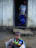 Young Boy Playing in Box Outside Home  Viti Levu  Western Division  Fiji