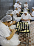 Kitchen Workers Making Portuguese Tarts at Antiga Confeitaria de Belem  Lisbon  Portugal