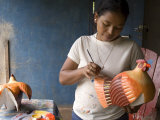 Woman Painting Balsa Wood Sculptures of Chickens  Rio San Juan  Nicaragua