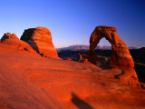Delicate Arch and Surrounding Slick-Rock with La Sal Mountains in Distance  Utah