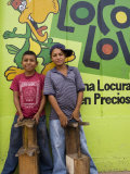 Shoeshine Boys Posing in Front of Colourful Wall  Esteli  Nicaragua