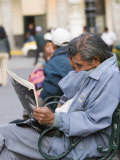 Man Reading Newspaper  Plaza de Armas  Peru