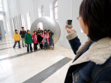 Woman Taking Group Photo Inside Seoul Museum of Art  Myong-Dong  Seoul  South Korea