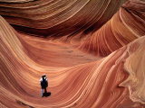 Man Walking through the Wave Formation  Vermillion Cliffs National Monument
