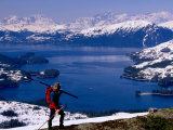 Cross Country Skier with Lake and Mountains in Background
