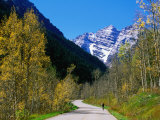 Cyclist on Road to Maroon Bells  Aspen  Colorado
