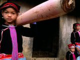 Ethnic Dao Tien Girl Carrying Banana Stalk for Pigs  Tam Duong  Lao Cai  Vietnam