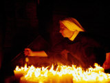 Nun Attending Candles at Stone Gate Shrine  Zagreb  City of Zagreb  Croatia