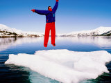 Man in a Survival Suit Jumping on an Ice Floe  Blackstone Bay  Prince William Sound  Alaska