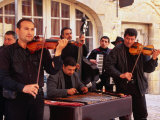 Gypsy Band Performing in Place du Peyrou  Sarlat-La-Caneda  Aquitaine  France