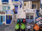 Motorbikes Parked Outside Shops