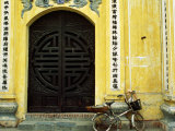 Yellow Nguyen Thai Hoc Temple Entrance and Bicycle  Hanoi  Vietnam