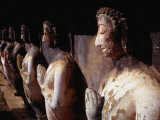 Buddhas in a Row at Wat Mahathat in Sukhothai Historical Park  Thailand