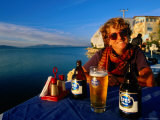 Smiling Female with Beer at Seaside Cafe on Yesilada Island  Egridir  Isparta  Turkey
