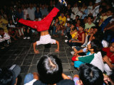 Youth Breakdancing with Crowd in Park on Dong Khoi Street  Ho Chi Minh City   Vietnam