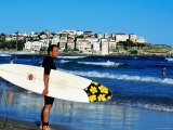 Surfer Carrying Surfboard on Bondi Beach  Sydney  New South Wales  Australia
