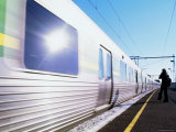 Suburban Train Passing Platform  Melbourne  Victoria  Australia