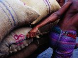 Worker Pulling Cart of Rice Sacks at Sadarghat Market  Dhaka  Bangladesh