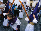 Children in Masks and Holding Sticks for Semena Santa Celebrations  Cordoba  Andalucia  Spain
