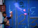 Boy Glides Kite in Street  Ko Panyi  Phang-Nga  Thailand