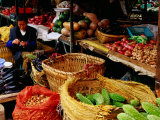 Trader at Market Stall in Old Town  Lijiang  Yunnan  China