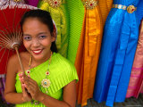 Girl Selling Dresses and Costume Materials Outside Temple of Dawn  Bangkok  Bangkok  Thailand