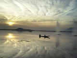 Kashmiri Women Row their Shikara in Dal lake in Srinagar  India