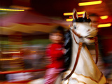 Child on Carousel at Grona Lund Amusement Park  Stockholm  Sweden