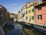 Boats and Colorful Reflections of Homes in Canal  Burano  Italy