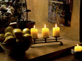 Still Life with Lighted Candles and Bowl of Lemons in Coffee Shop  Tallinn  Estonia
