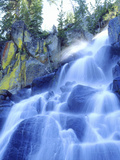 Waterfall Cascades Past Lichen-Covered Rocks  Sierra Nevada Mountains  California  USA