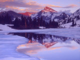 Mount Dana at Sunset Reflecting in Partially Frozen Lake  Sierra Nevada Mountains  California  USA