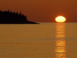 Spring Sunrise Silhouettes Edwards Island and Reflects Light on Lake Superior