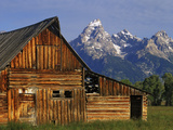 Weathered Wooden Barn Along Mormon Row with the Grand Tetons in Distance  Grand Teton National Park