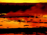 Vapor Flows from Grand Geyser at Sunset  Yellowstone National Park  Wyoming  USA