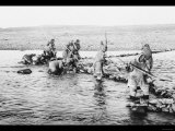 Inuit Killing Salmon with Spears