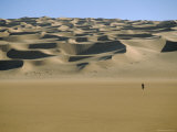 Sahara Desert with Lone Figure in Foreground  Amguid  Algeria  Africa