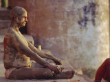 Hindu Pilgrim Meditating  Sitting Cross-Legged on the Ghats  Varanasi  Uttar Pradesh State  India
