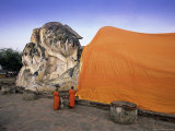 Two Novice Buddhist Monks in Front of a Statue of the Reclining Buddha  Central Thailand  Thailand