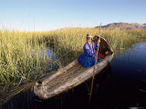 A Uros Indian Woman in a Traditional Reed Boat  Lake Titicaca  Peru